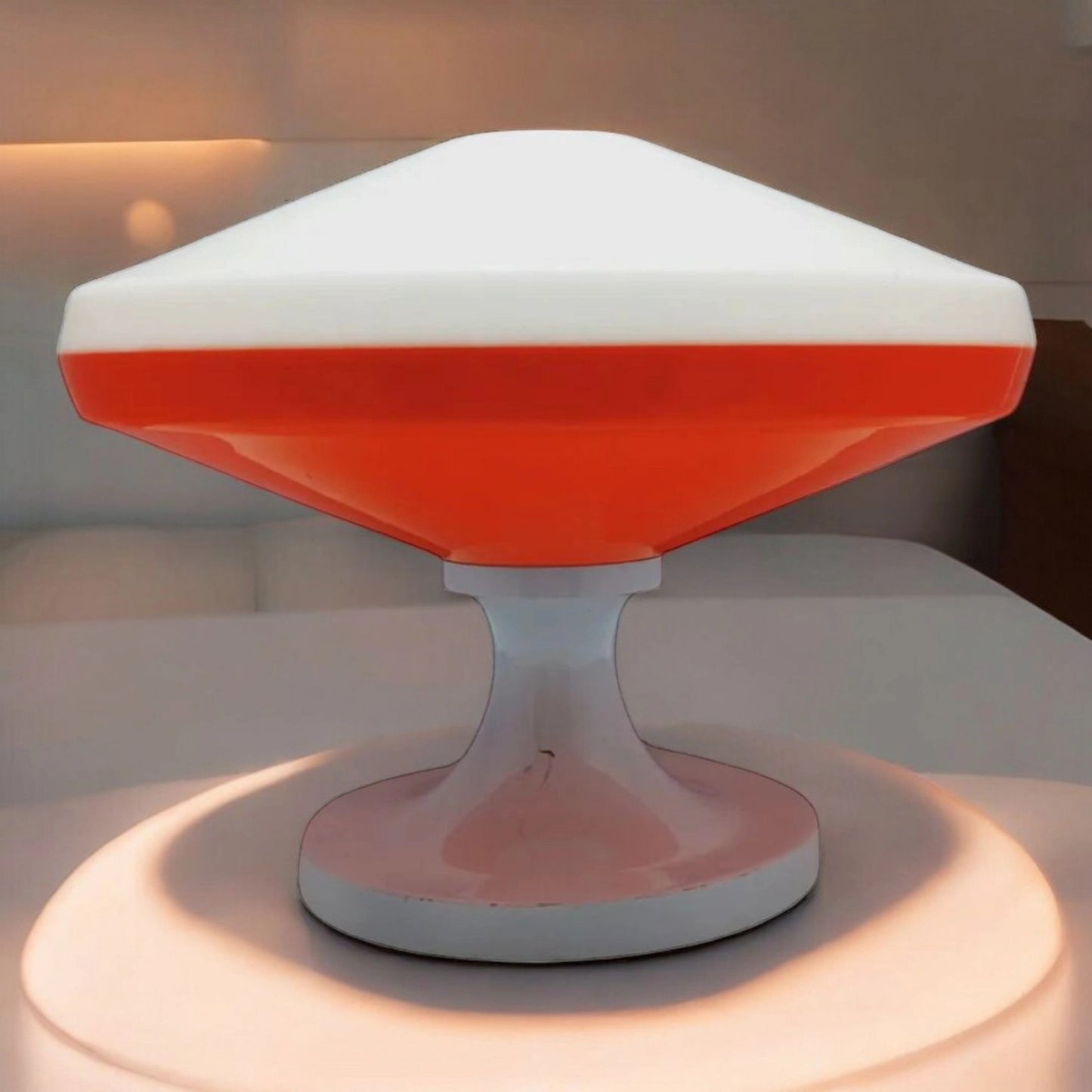 Mid-Century Modern table lamp illuminated.