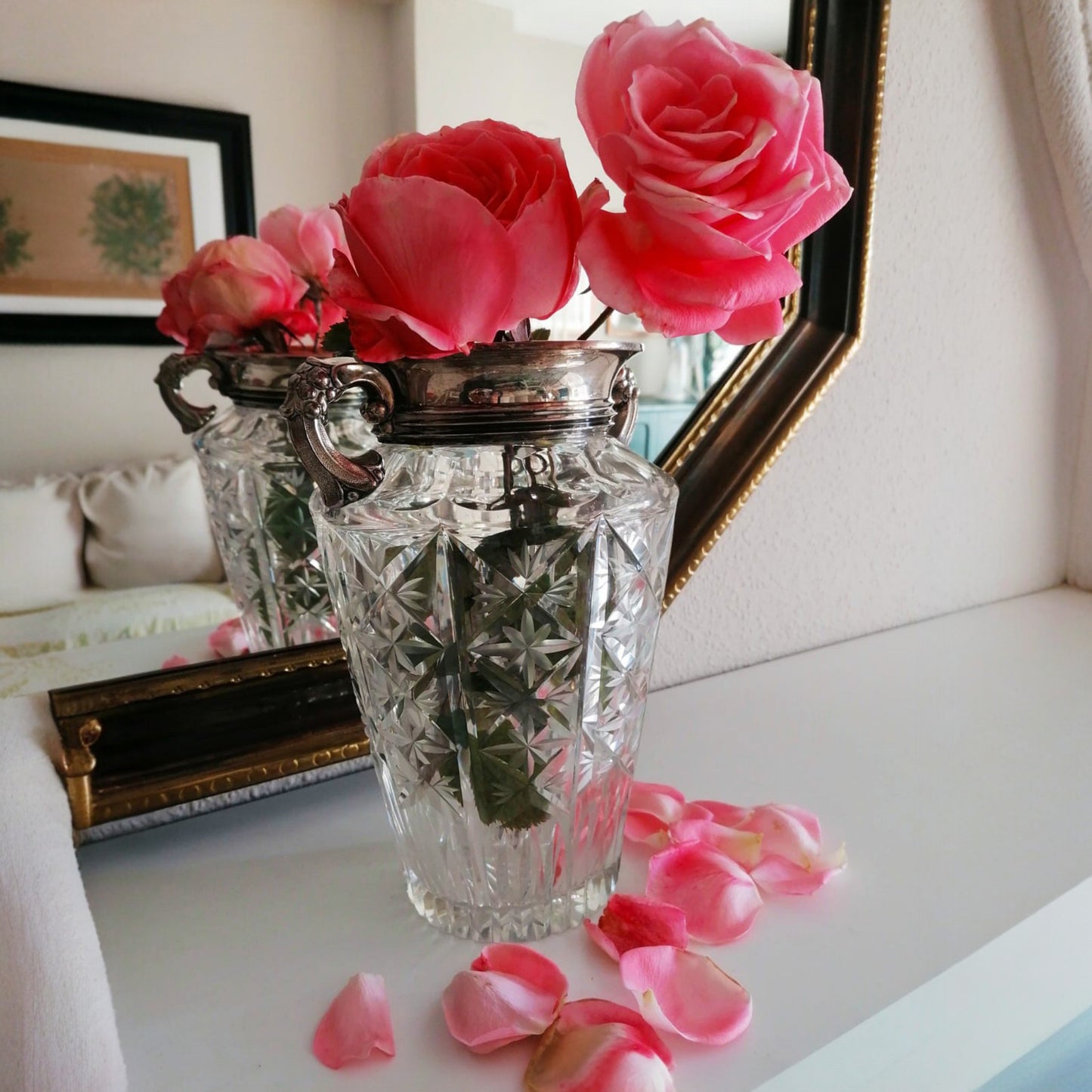 Vintage cut-pattern glass vase used as a floral centrepiece.