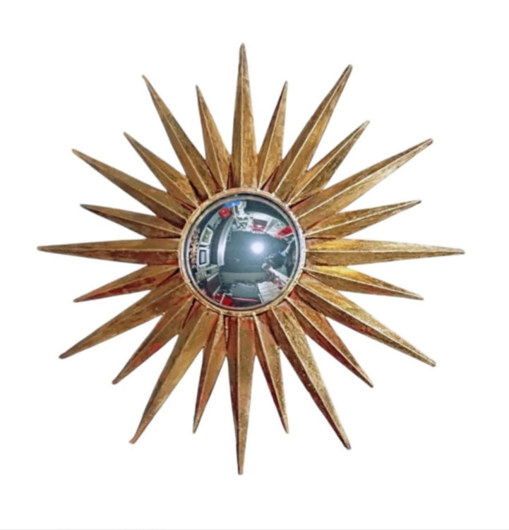 Gold-toned convex sunburst mirror with triangular rays