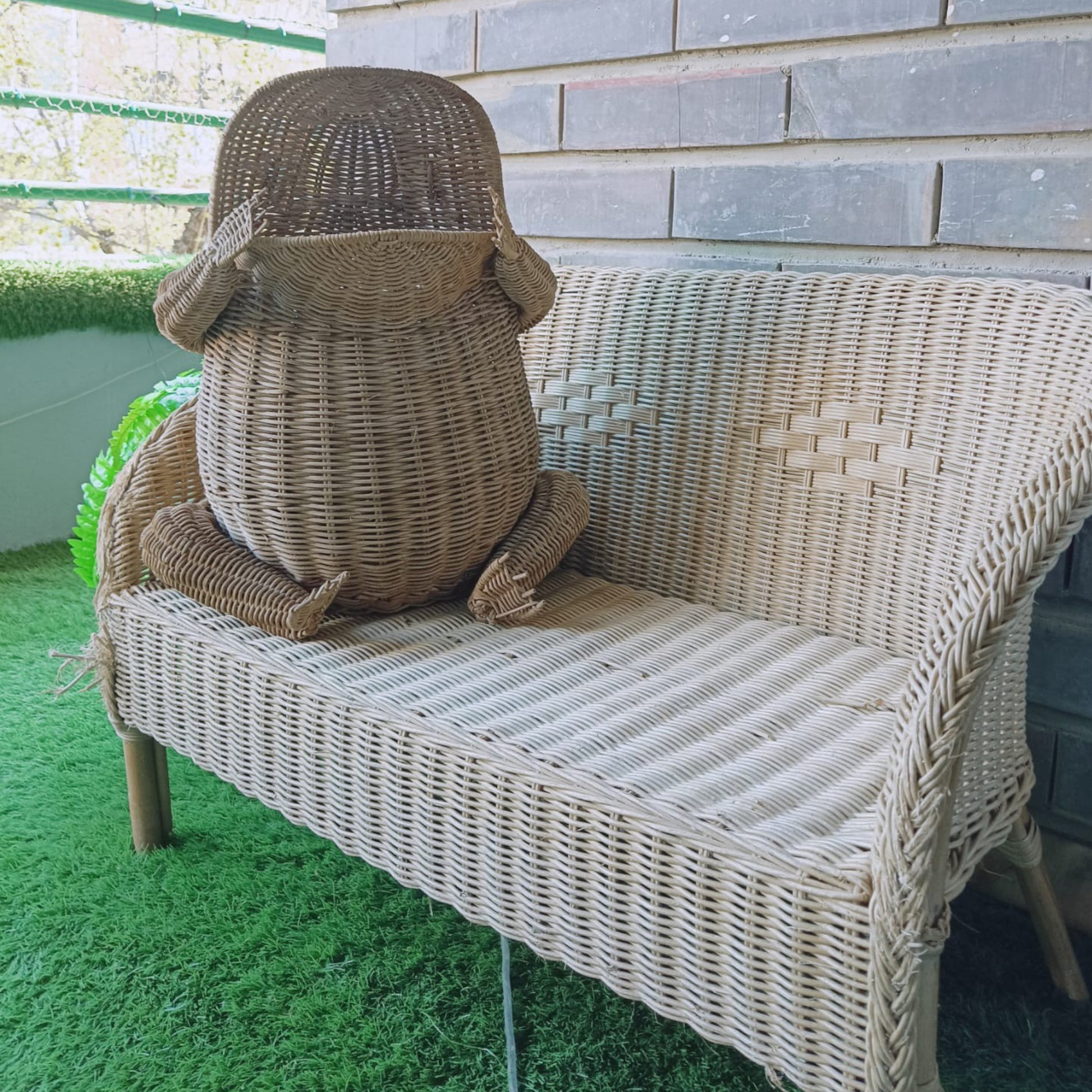 Vintage frog-shaped wicker basket, front view