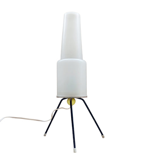 Opal plastic tripod table lamp shown unlit from the front