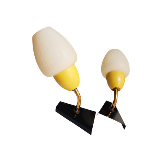 Pair of vintage mid-century wall lights with white shades, yellow fittings and black wall plates