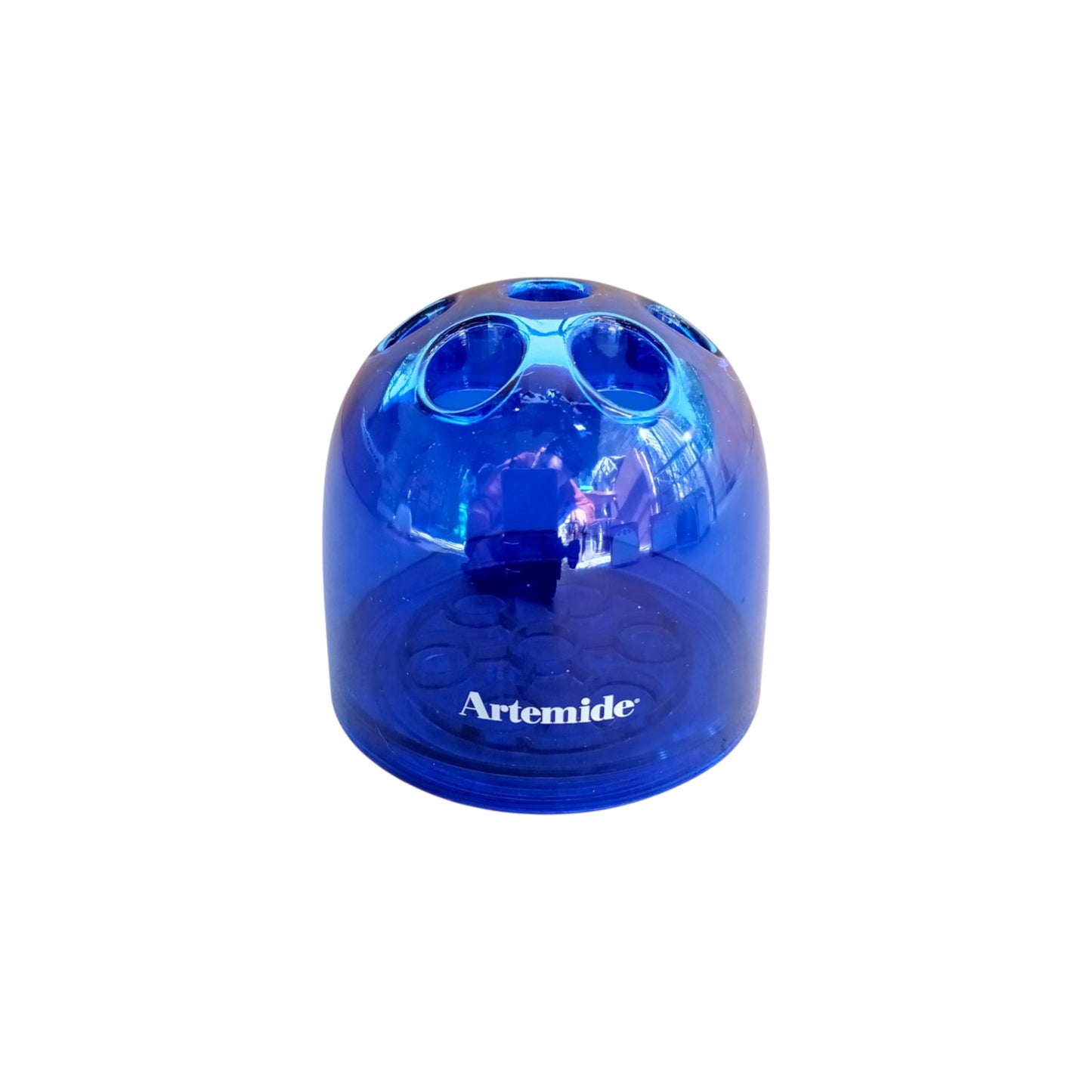 Front view of the translucent blue Artemide Dedalino pencil holder