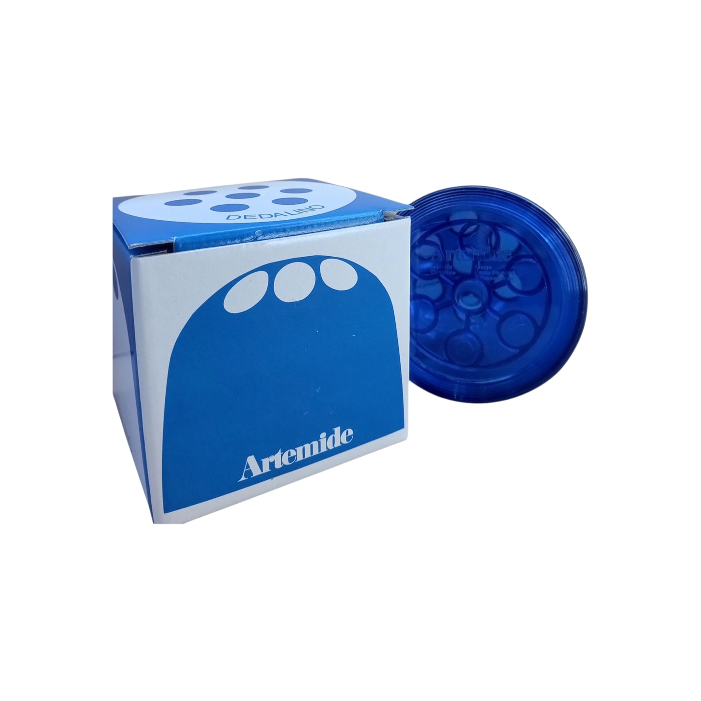 Base of the translucent blue Artemide Dedalino beside its original branded box
