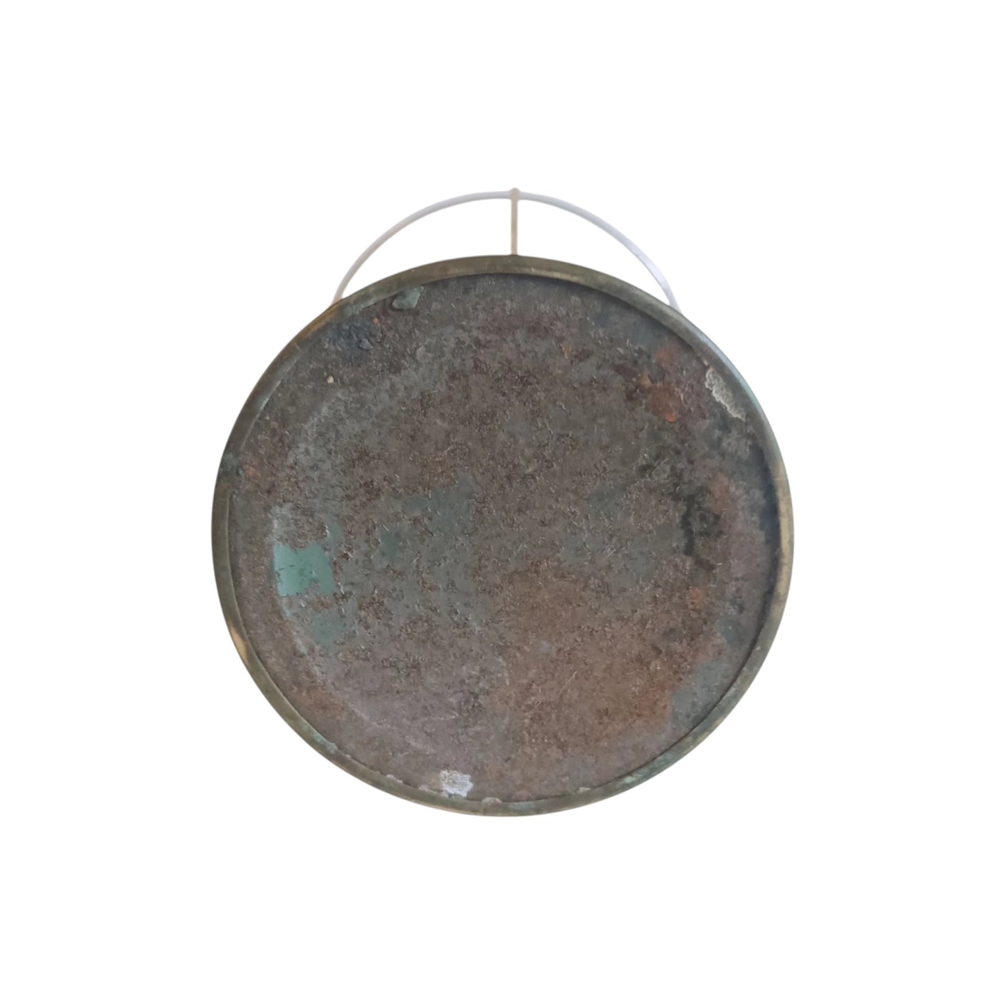 Underside of the antique oil lamp showing age-related oxidation