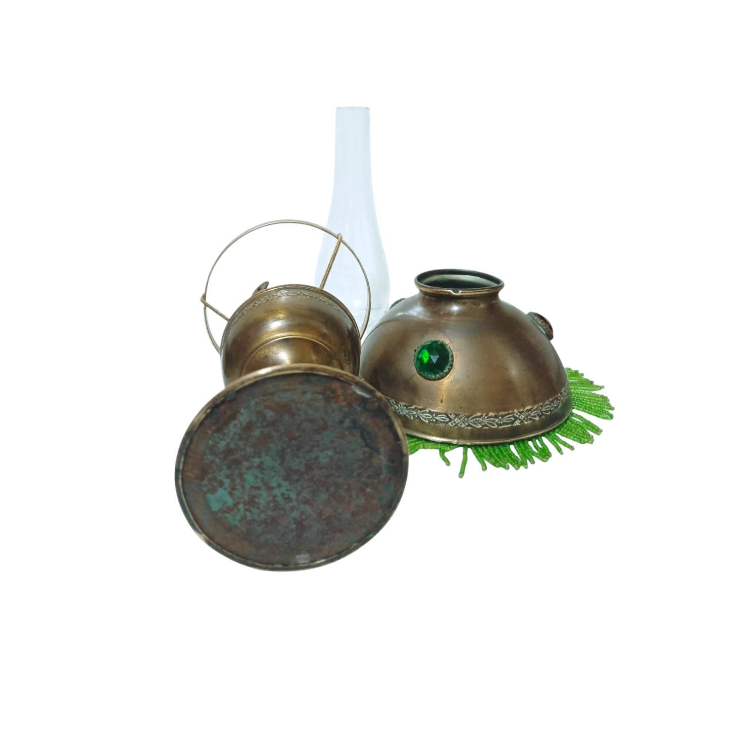 Underside of the lamp reservoir and detached beaded shade