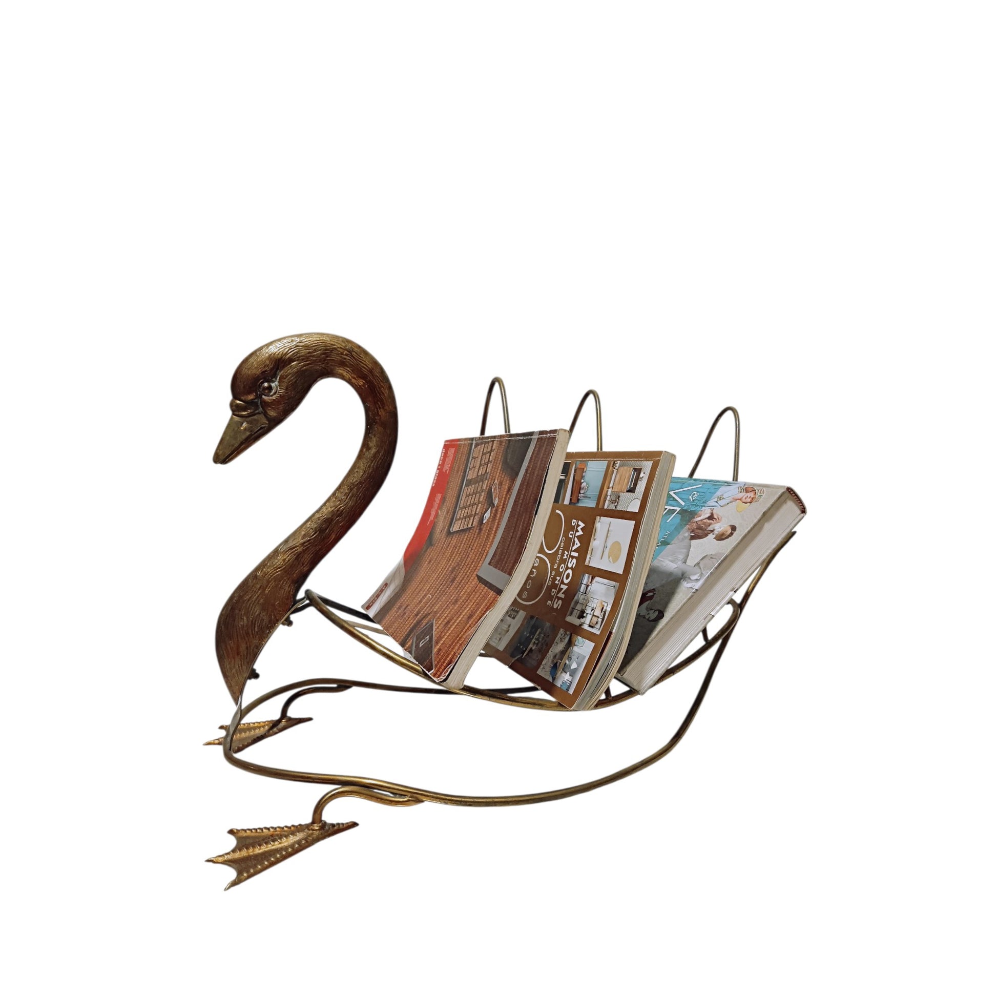 Side view of swan-shaped magazine rack displayed with magazines