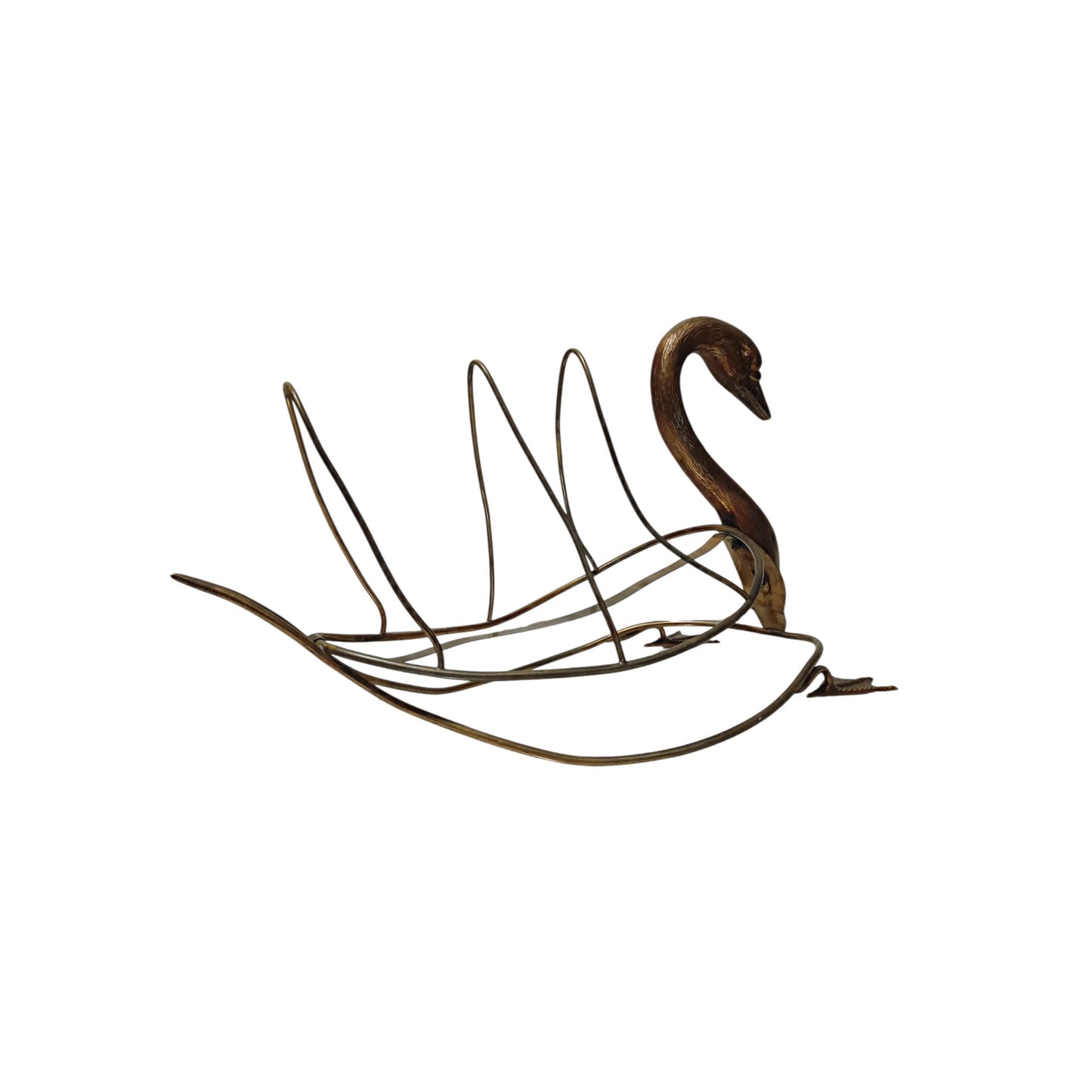 Side view of vintage swan-shaped magazine rack in brass-toned metal 