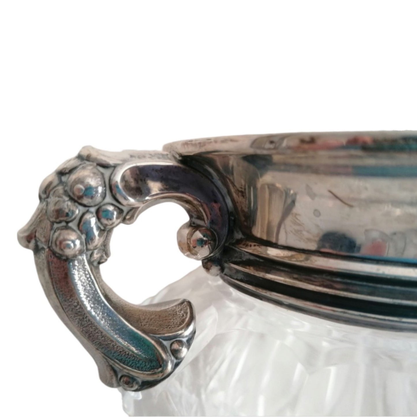 Side view of the vintage glass vase decorative metal handle.