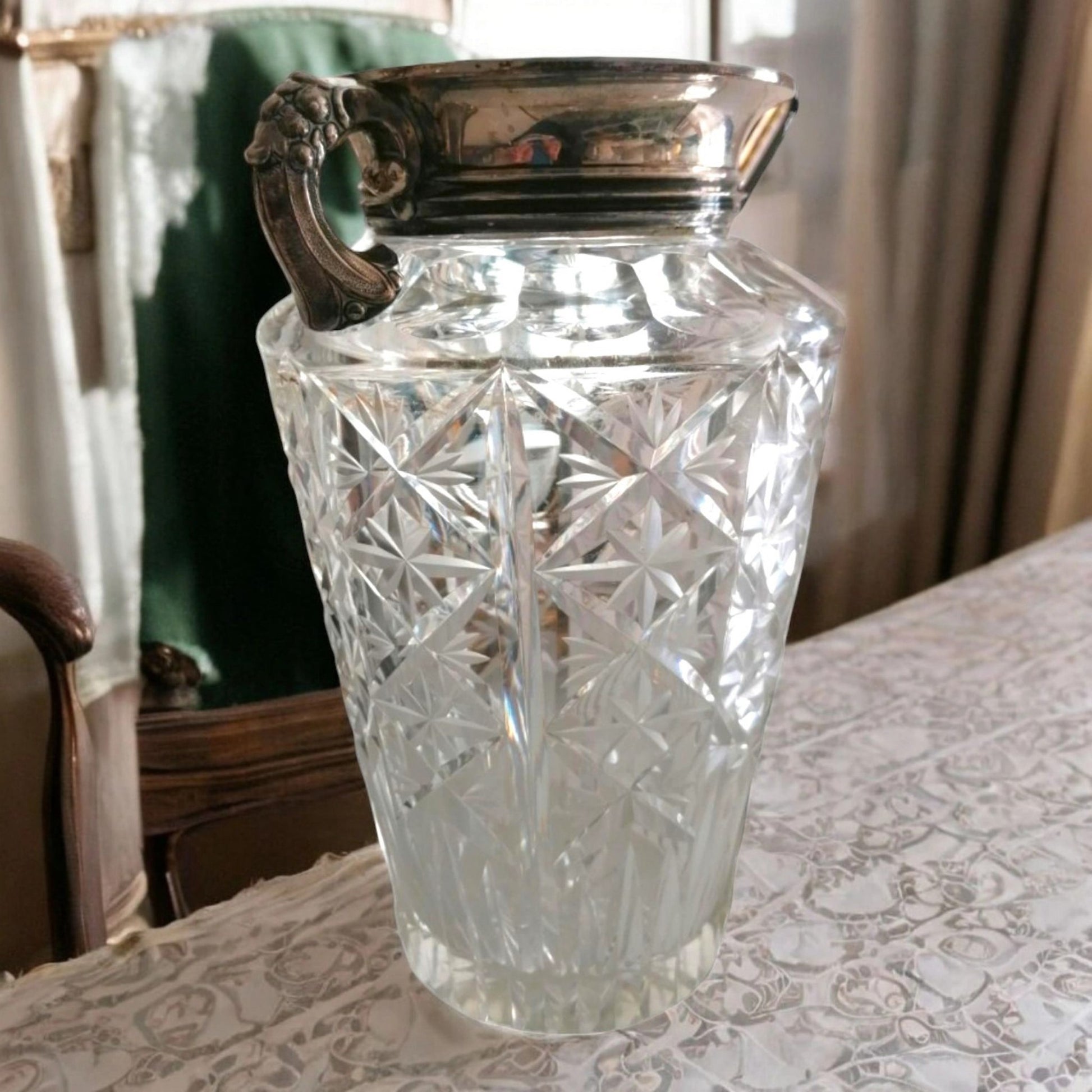 Vintage glass vase displayed on a table.