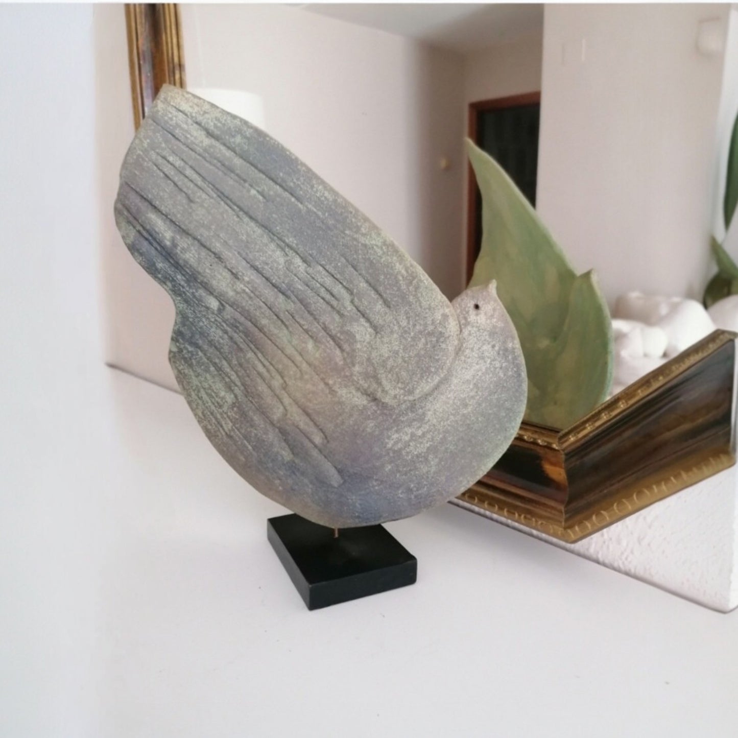 Vintage ceramic dove sculpture by Encarna Martín García displayed in a contemporary interior