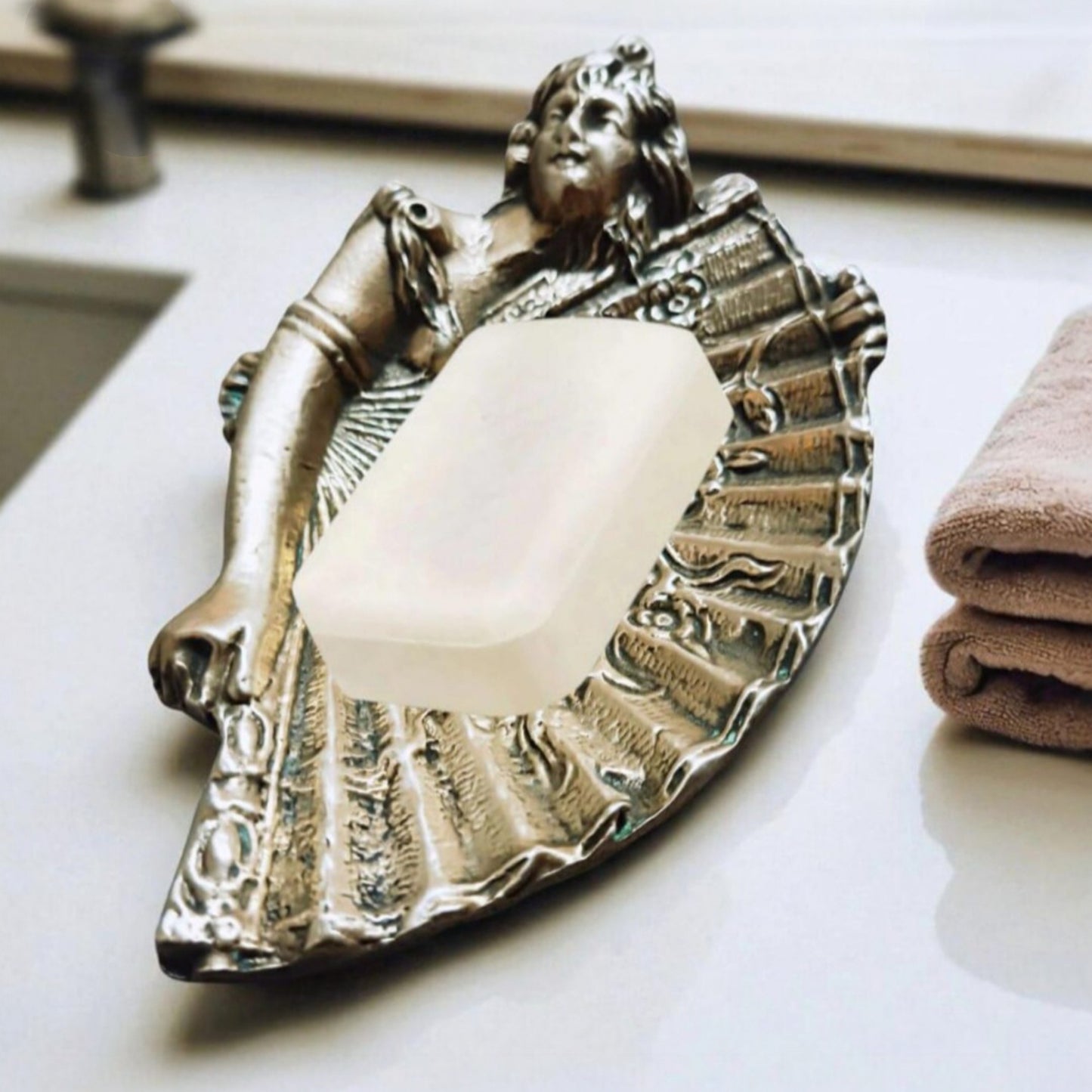 Vintage lady and fan dish displayed as a soap holder