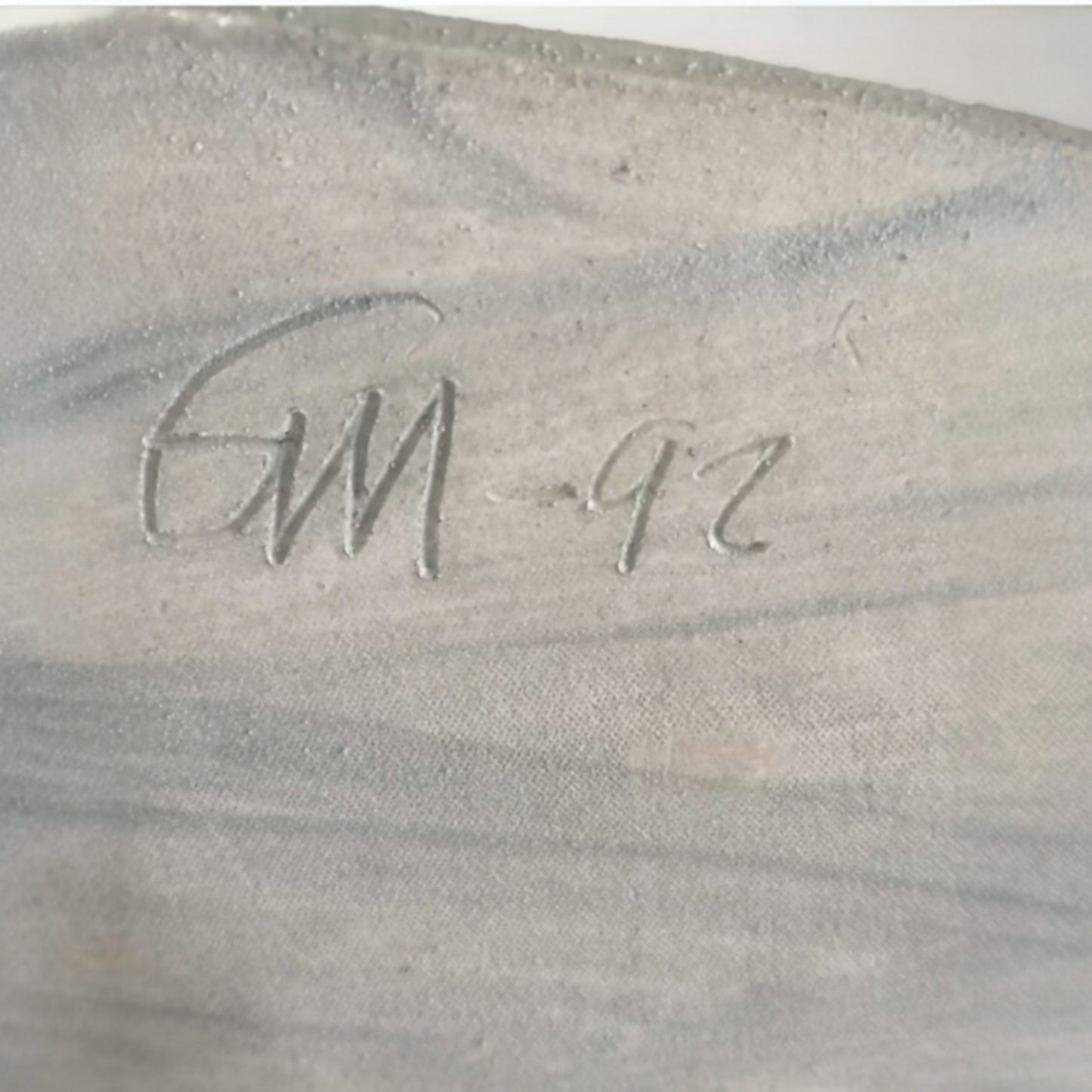 Detail of the artist's signature and 1992 date