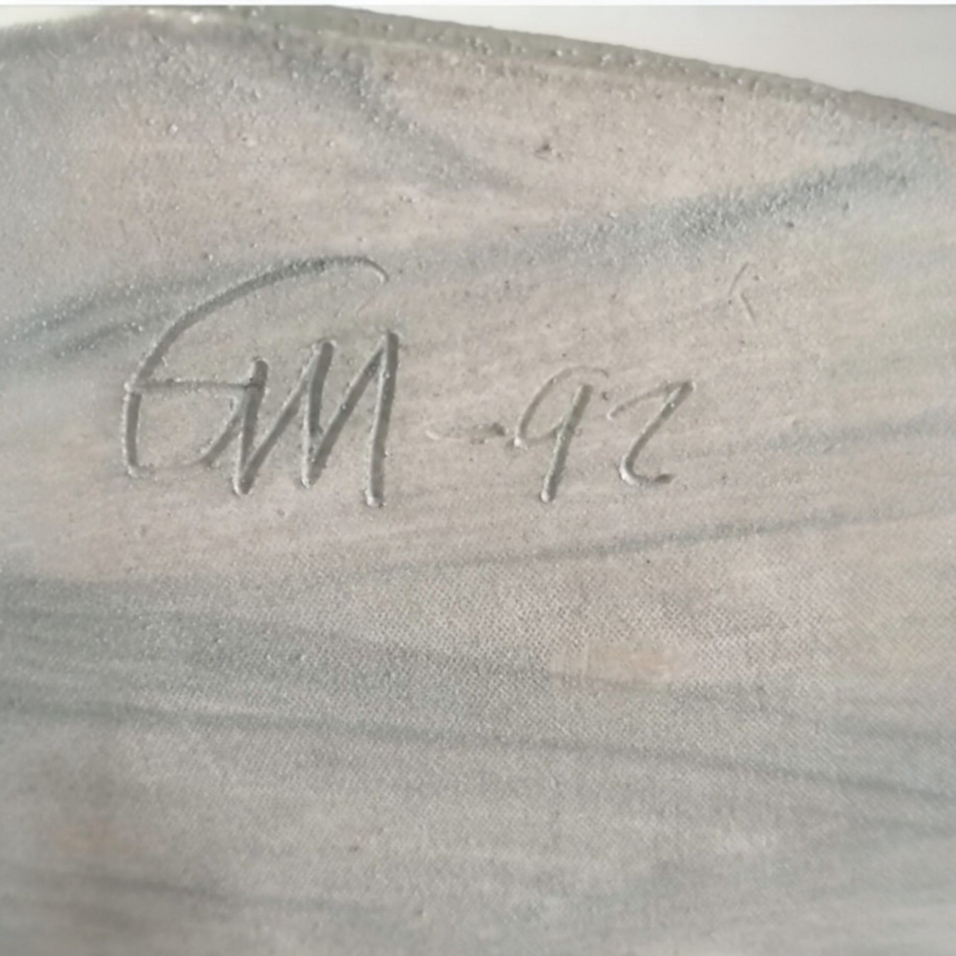 Detail of the artist's signature and 1992 date