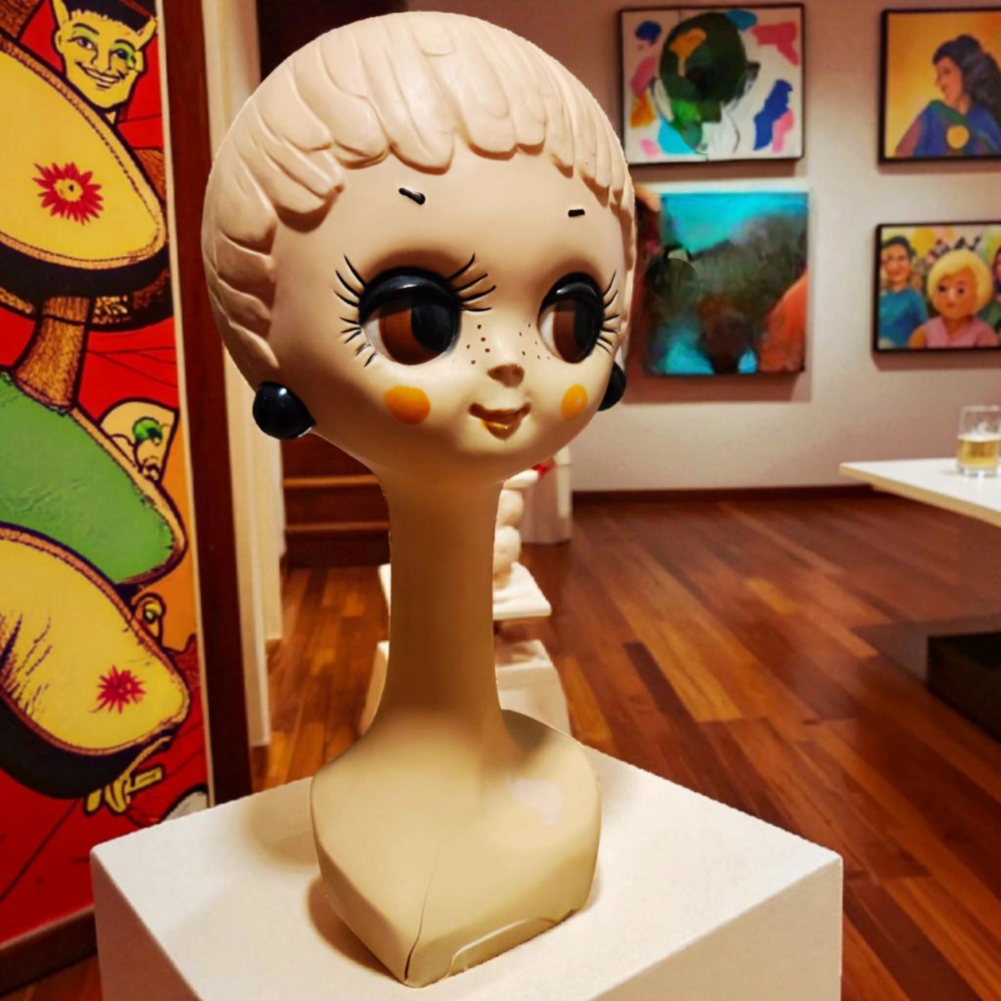 Vintage female mannequin bust displayed in a Pop Art-inspired interior 