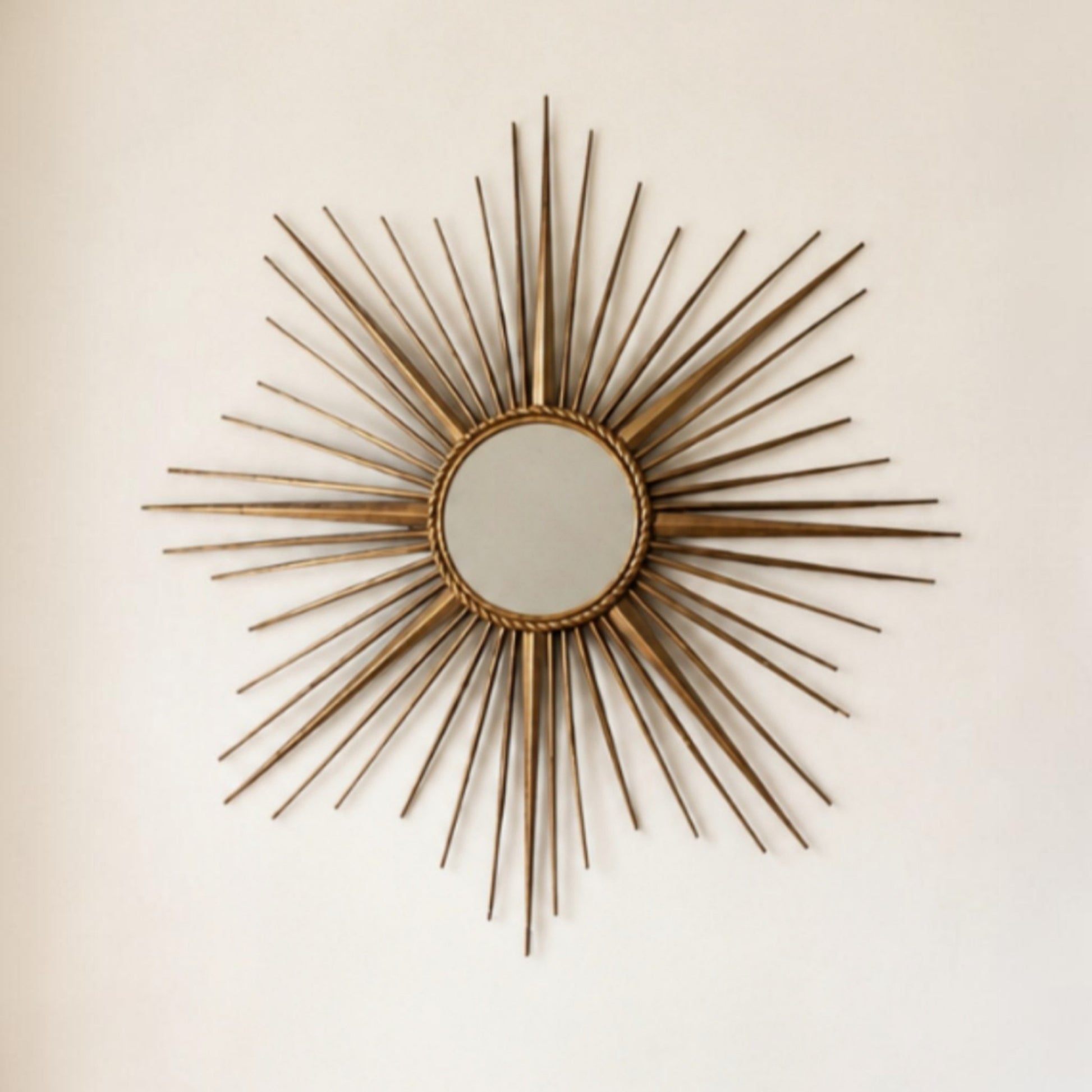 Full front view of the vintage Vallauris sunburst mirror.