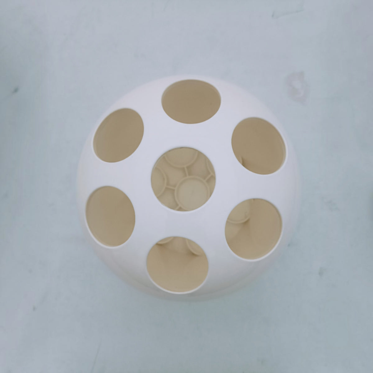 Top view of Dedalotto vase with circular flower openings 