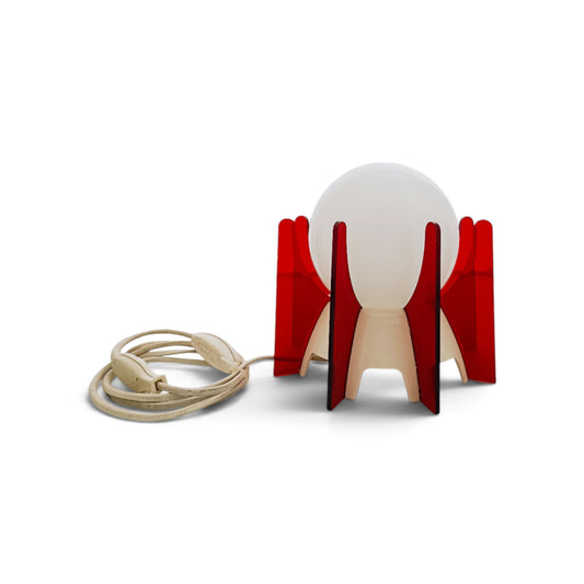 Red acrylic and white opaline glass IXO table lamp, front view on white.
