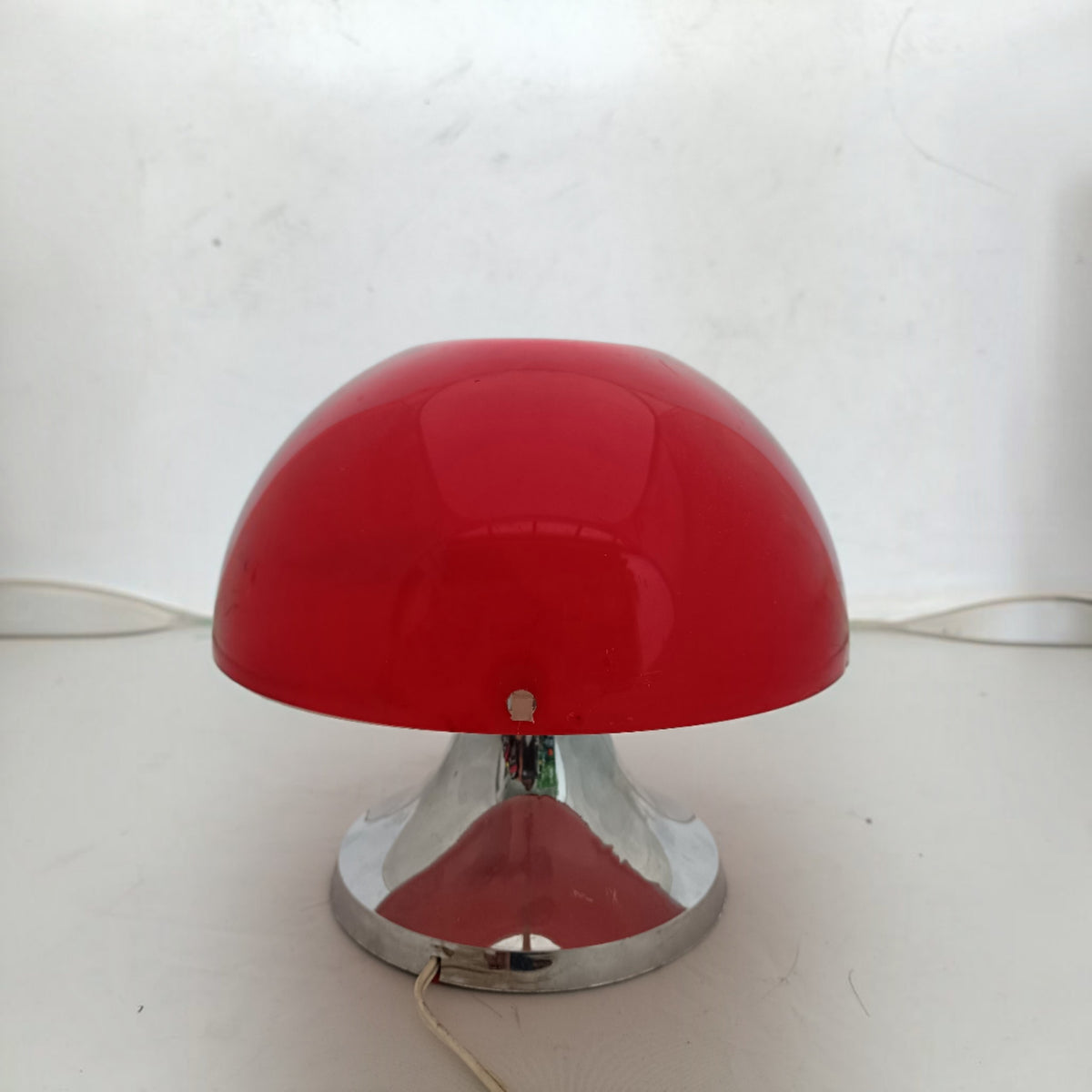 Red IXO table lamp with domed shade and chrome-effect flared base