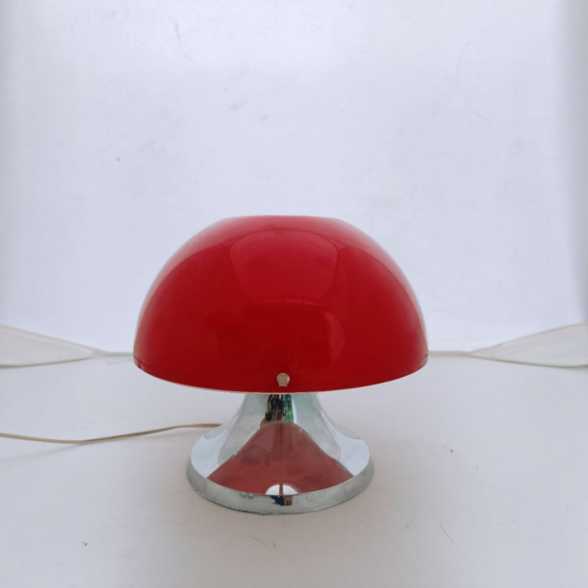 Red IXO mushroom lamp with domed shade and chrome-effect flared base