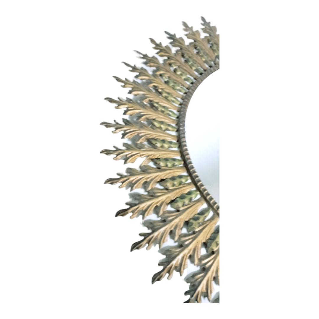 Sunburst mirror, leaf frame detail 