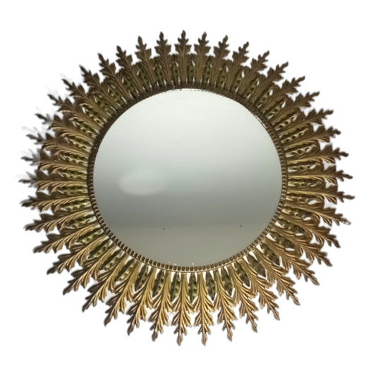 Gold-toned sunburst mirror with leaf rays 