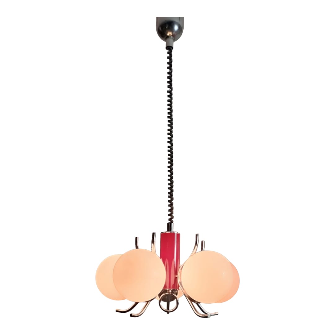 Opaline glass pendant lamp shown illuminated