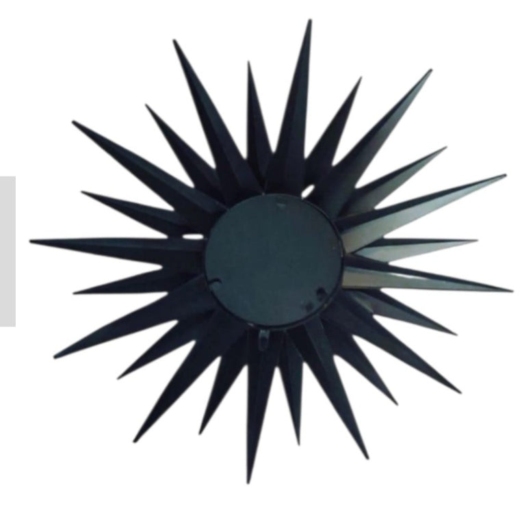 Rear view of convex sunburst mirror with triangular rays