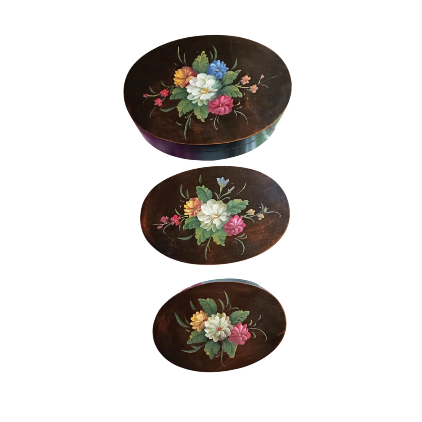 Three nesting wooden boxes displayed from largest to smallest 