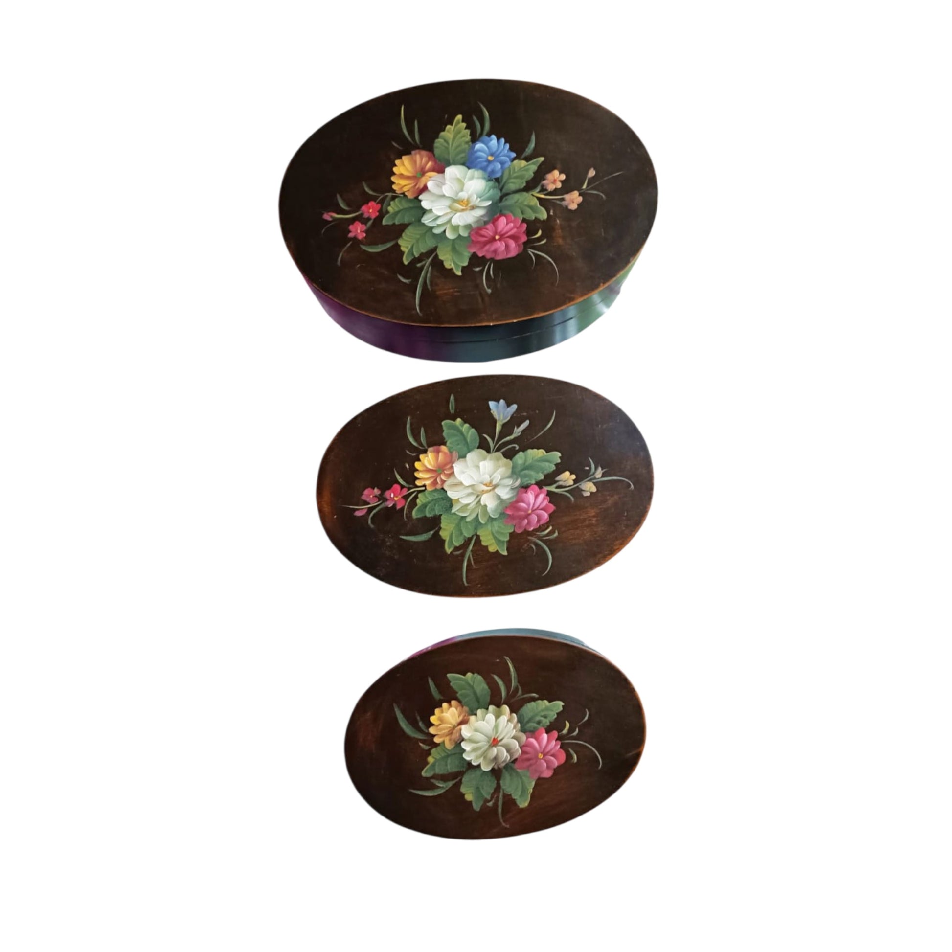 Three nesting wooden boxes displayed from largest to smallest 