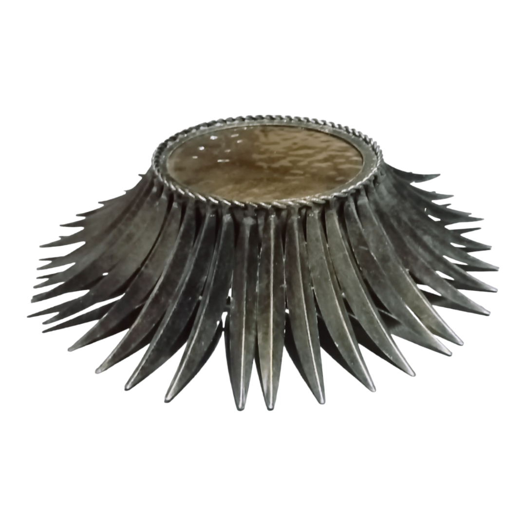 1950s Sunburst lamp with golden glass and radiating metal design. Side view