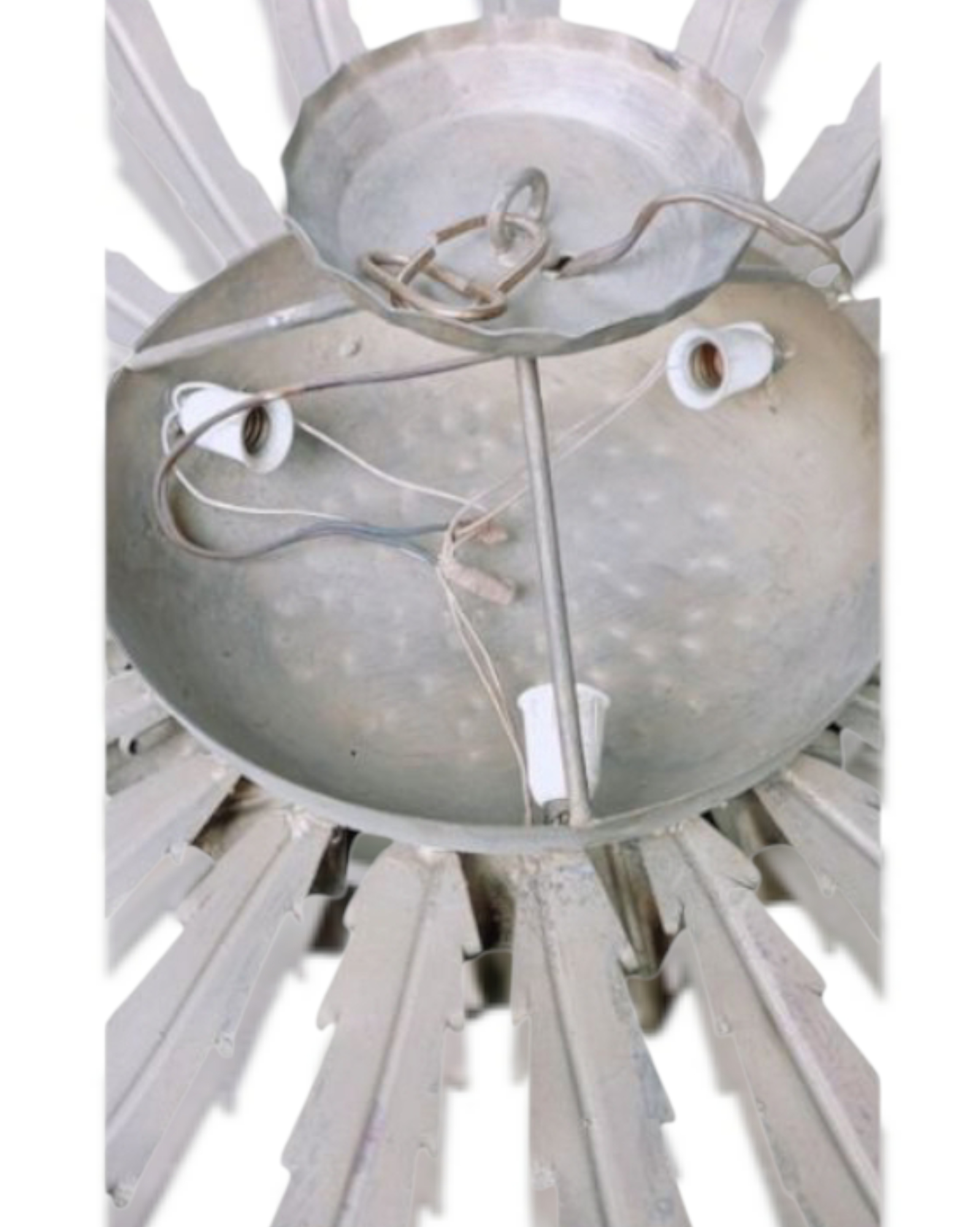 Close-up. Rear view of vintage iron Sunburst lamp structure