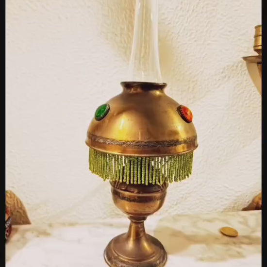 Victorian bronze oil table lamp with green and amber cabochons