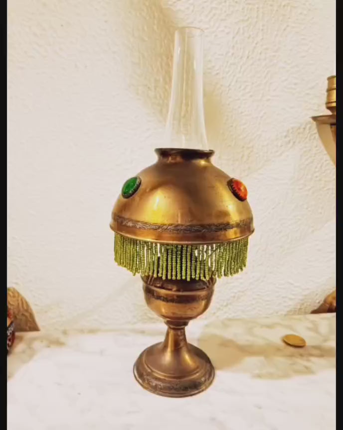 Victorian bronze oil table lamp with green and amber cabochons